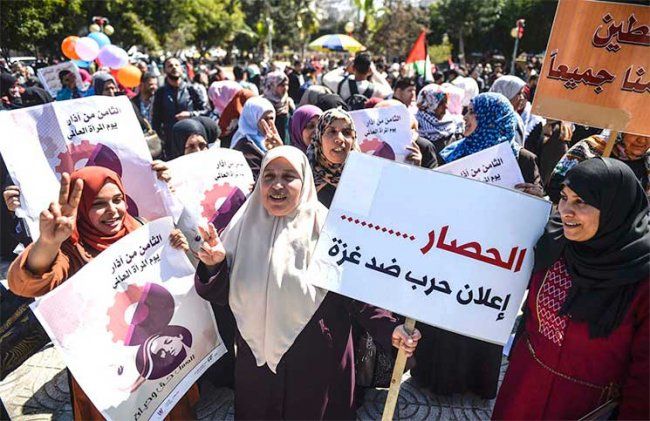 وقفة نسوية بغزة نصرةً للقدس ورفضاً لقرار ترامب
